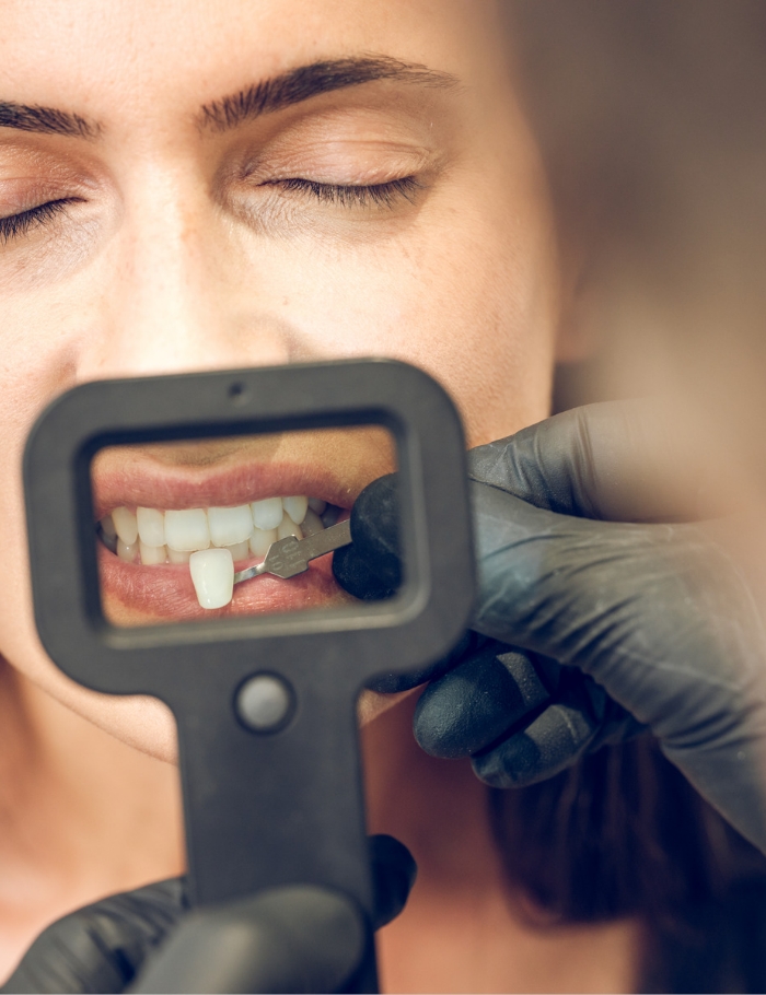 dr mai checking teeth